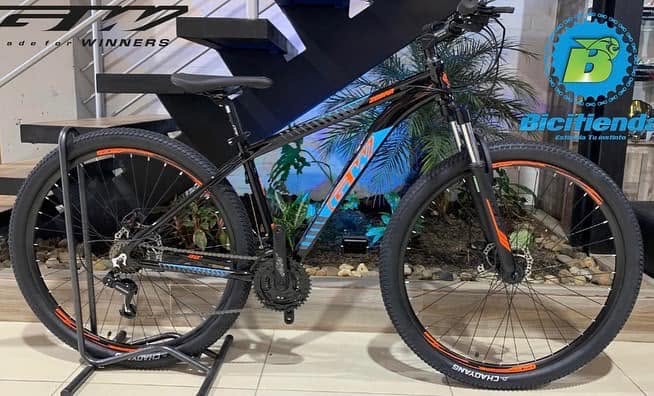 Bicicleta GW MTB negra y naranja — Bicitienda Norte